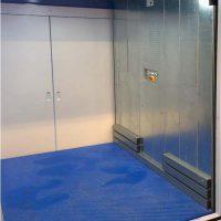 Personengoederenlift in bouwkundige schacht